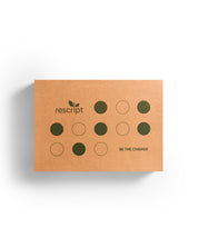 Kraft paper box with 'rescript' branding and circular designs on a white background