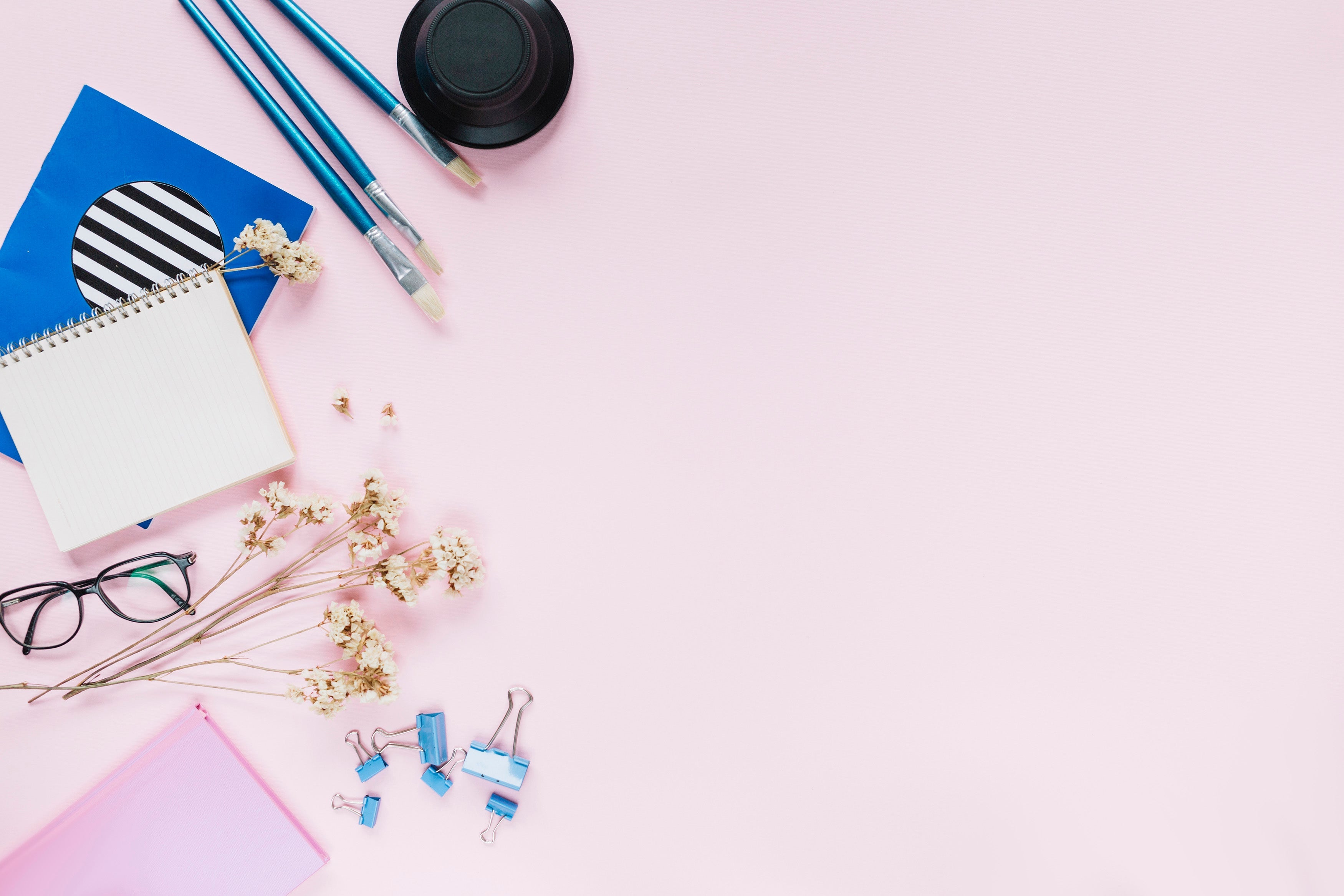 Pastel-toned flatlay of stationery and notebook, capturing the Studygram aesthetic