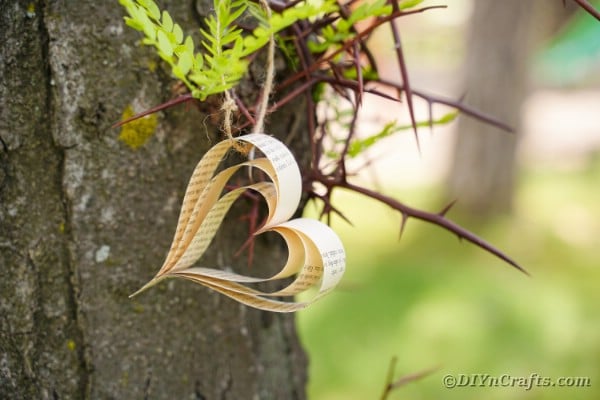 Rustic paper hearts made from recycled book pages for eco DIY recycled paper crafts