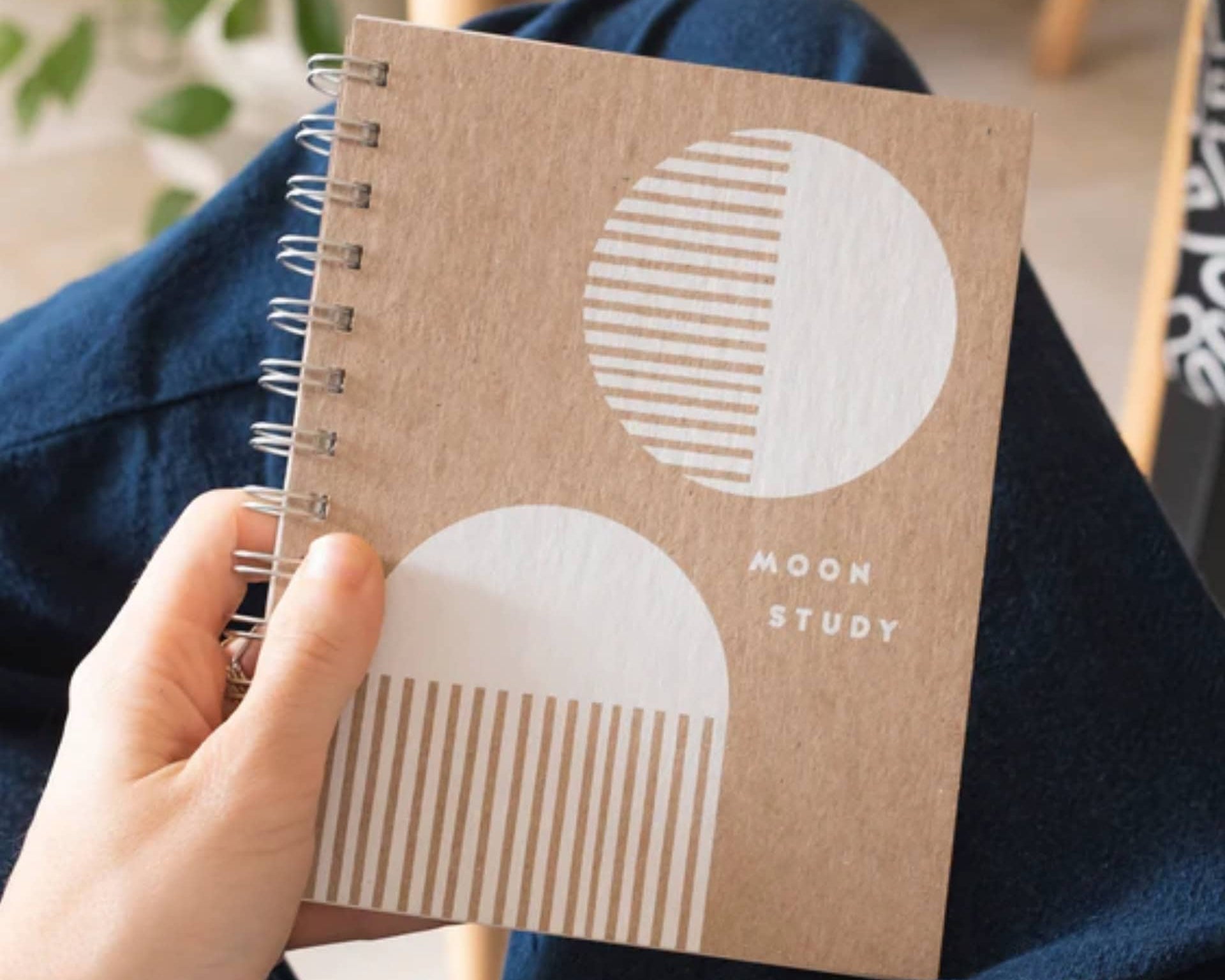 Sustainable school supplies including recycled notebooks, eco-friendly paper clips, and green stationery