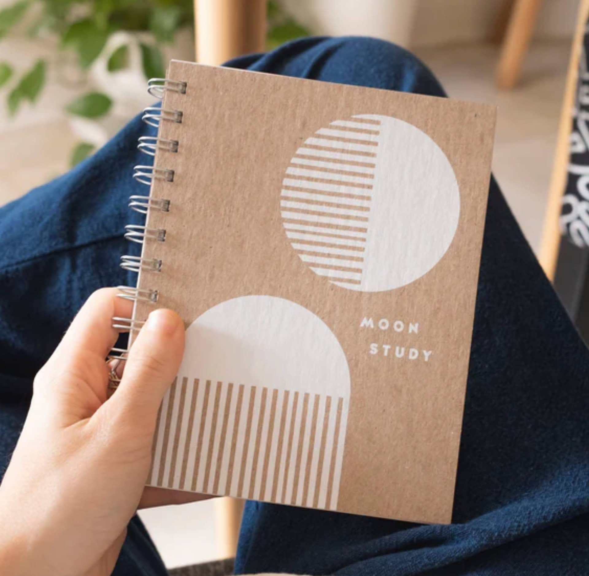 Sustainable school supplies including recycled notebooks, eco-friendly paper clips, and green stationery